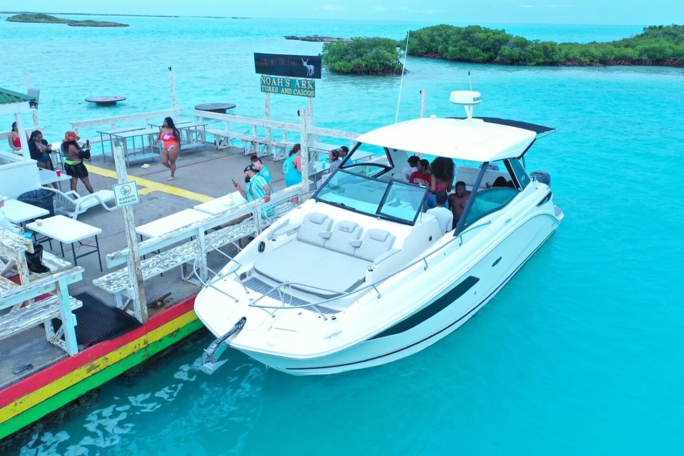 Boats moored around the Noah's Ark floating bar
